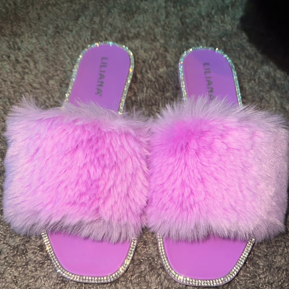 Purple jelly slide with fur w/rhinestone embellishments on the side.